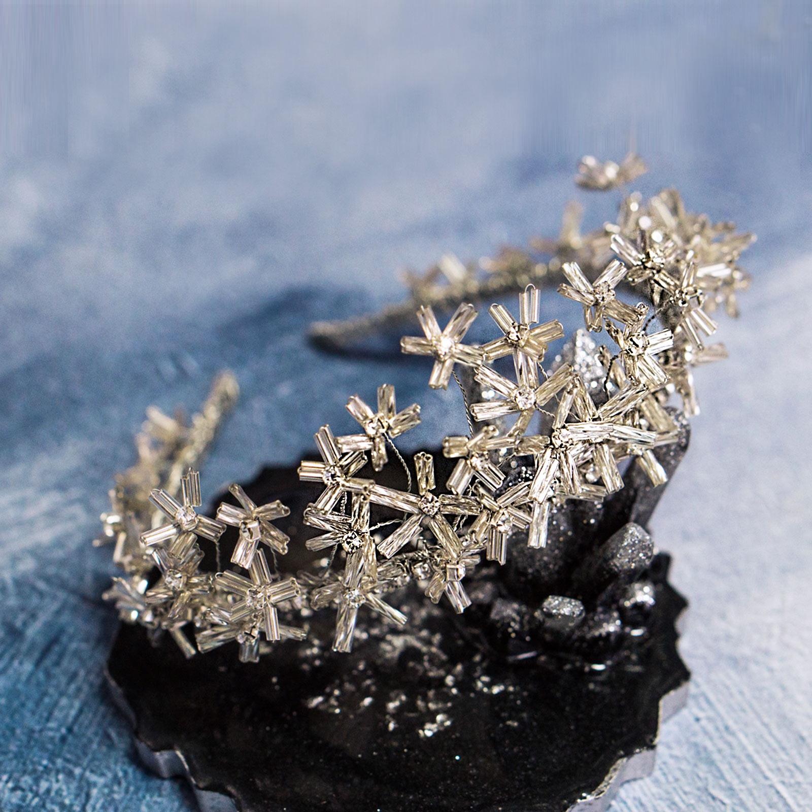 Side view of silver flower tiara for bride