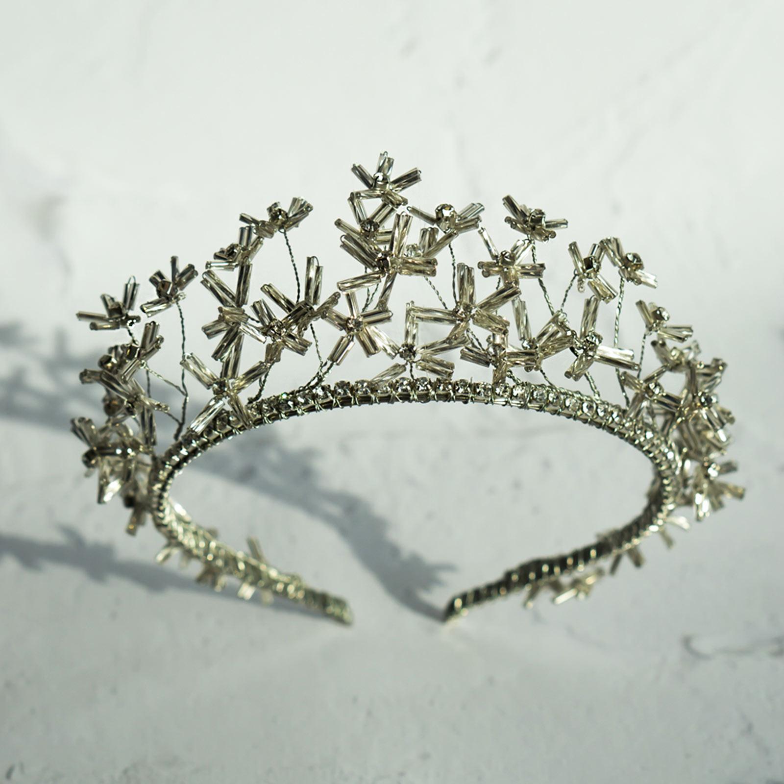 Daisy silver flower tiara on white background
